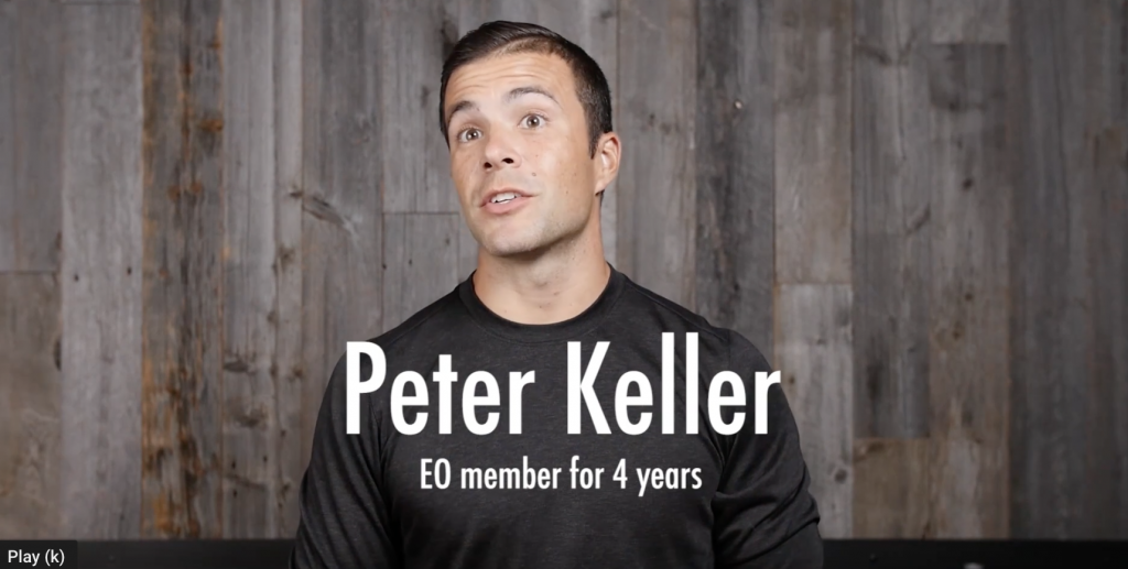 An EO member looking at the camera with the words "Peter Keller, EO member for 4 years" on the screen